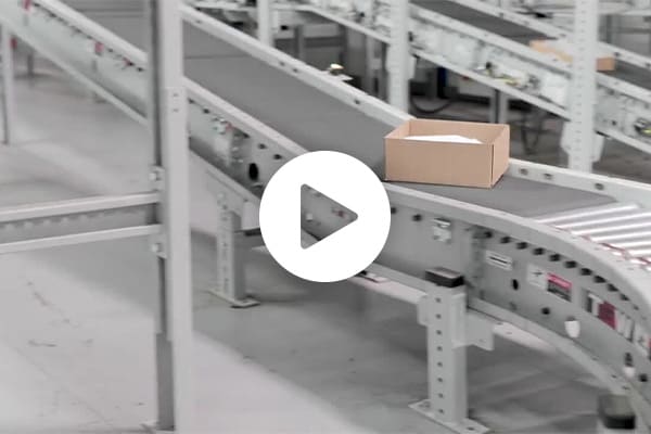 Conveyor belt in the Mouser warehouse with a box on it